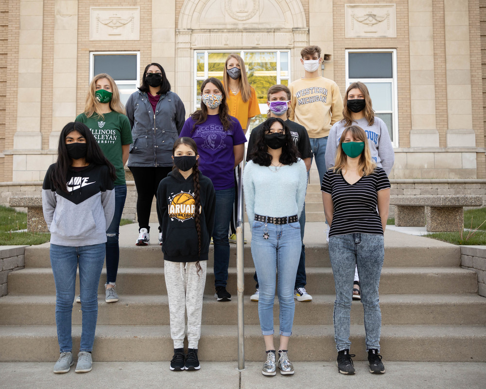 State Scholar students stand on front steps of Harvard High School for photo